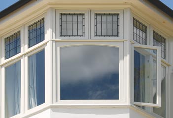 Edwardian Bay Window with swept head arch matches the original 1902 window like for like