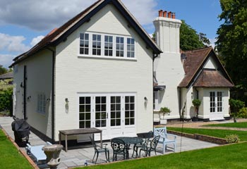 Stylish Flush casement windows with traditional French doors