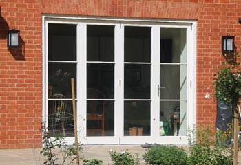 Bifold Doors can look very traditional with addition of narrow but detailed astragal bars