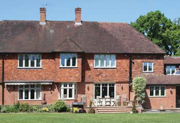 Softer character. The original 1920’s Crittall windows and doors in mock Georgian design were too fussy for the new owners so we created a sympathetic design with enough character and light to soften the look and open up the light for the stunning country home.